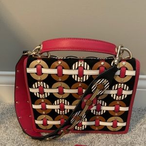 Henri Bendel Woven Circles bag